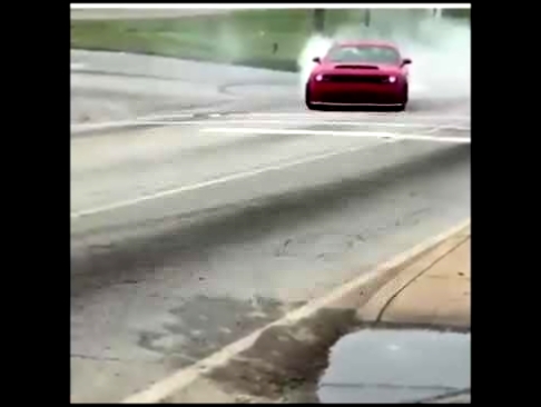 21 Savage doing donuts in his Dodge Demon 